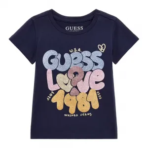 Тъмно синя тениска с къс ръкав с цветни надписи и глитери за момиче Guess