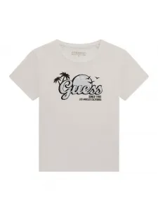 Бяла тениска със сребрист надпис Guess за момиче